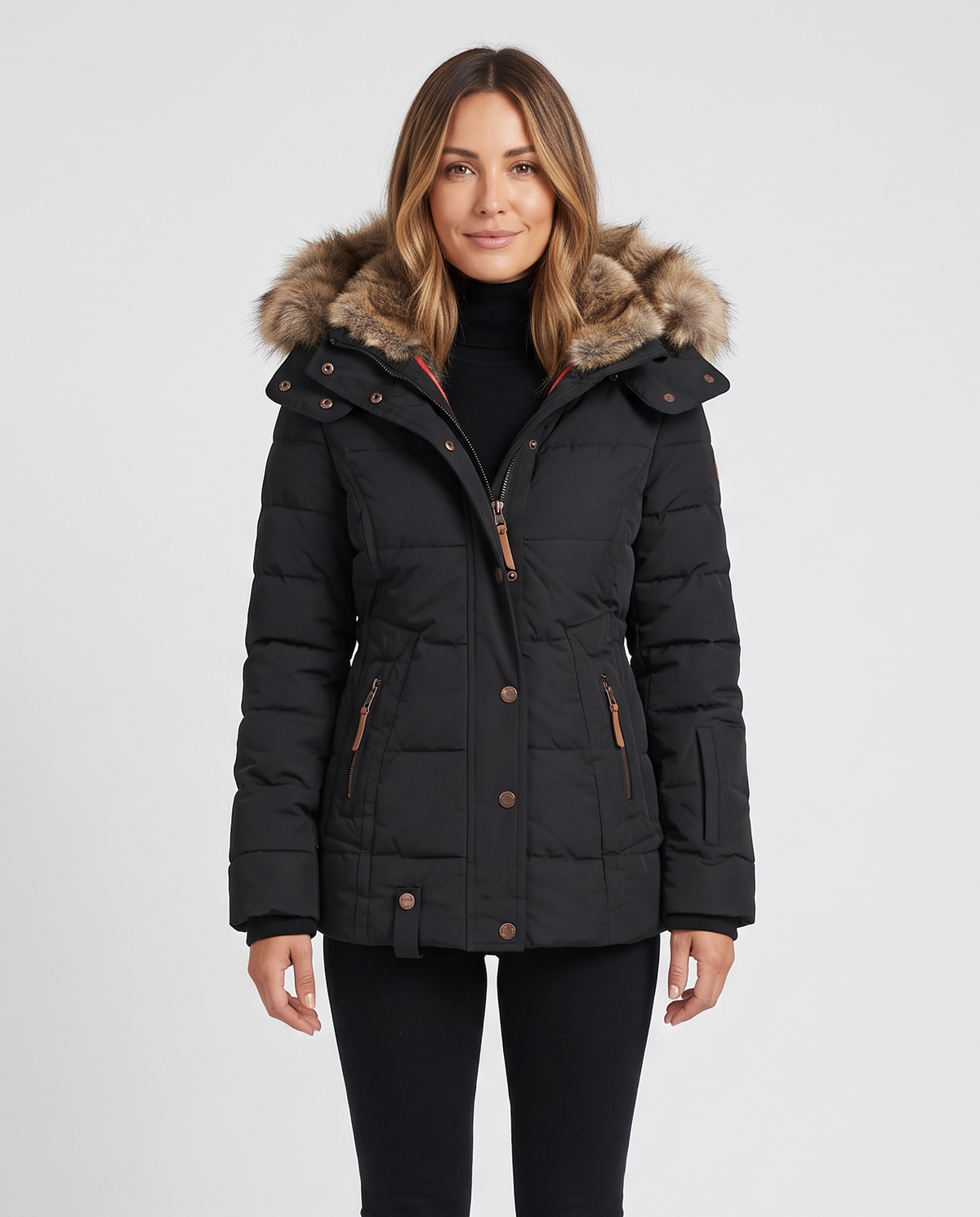 Women's quilted winter puffer jacket with a faux fur lined hood, snap button placket over a zip, zip pockets with leather pulls and a fitted waist in Black, front view