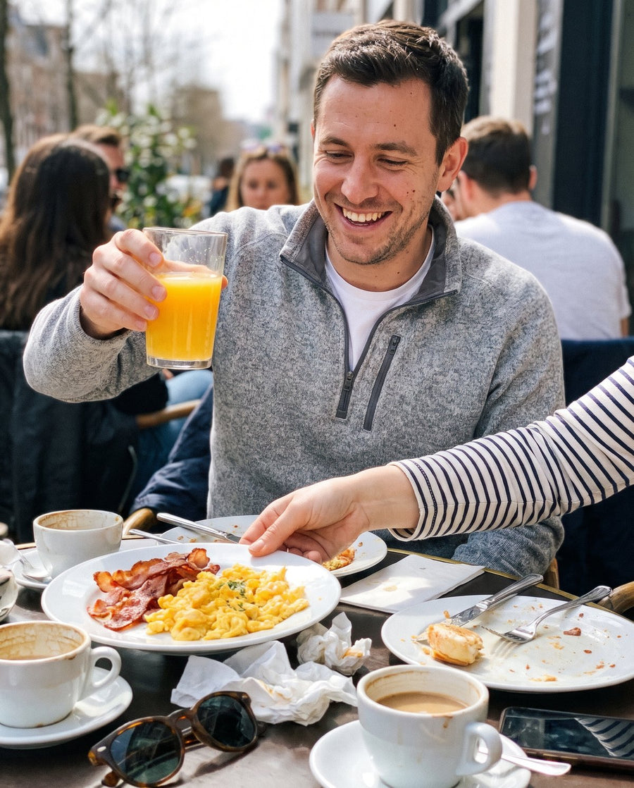 Man in a grey quarter zip at brunch